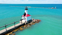 
  The Michigan City Pierhead Light and Michigan City Breakwater Light have lit the city’s harbor for more than 100 years. 
  